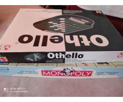 Othello and Monopoly board games. Both hands for $12