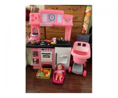 Pink toy kitchen great and clean condition. Burner makes sounds. Comes with accessories in photos. P