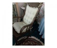 Vintage rocking chair with chair pads