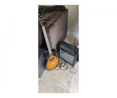 Epiphone electric guitar with fender mustang one amp