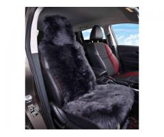 Black fur car seat cover lined with picket back