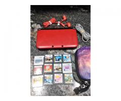 Nintendo 3DS XL with 12 games, case, charger mario kart, headphones